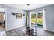 Sunroom with sliding glass doors that open to a patio and backyard, perfect for indoor-outdoor living at 1646 Flicker Rd, Jonesboro, GA 30238
