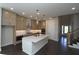 Bright kitchen with white countertops, stainless appliances, and a large center island at 4435 Beechnut Cir, Cumming, GA 30028