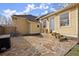 Charming backyard patio with stone pavers, steps up to the door, and a sunny atmosphere at 916 Virginia Circle Northeast Ne Cir, Atlanta, GA 30306