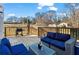 Backyard Deck with outdoor seating and wooded views, creating a serene outdoor space at 392 Fourth St, Forest Park, GA 30297