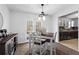 Bright dining room featuring a table with seating for four and natural light at 392 Fourth St, Forest Park, GA 30297