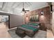 Modern bedroom with brick wall, stylish furniture, and contemporary lighting at 434 Marietta Nw St # 301, Atlanta, GA 30313
