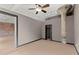 Spacious bedroom with ceiling fan, hardwood floors, and exposed concrete pillar at 434 Marietta Nw St # 301, Atlanta, GA 30313