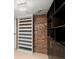 Closet with shelving, set against an exposed brick wall in a modern industrial style home at 434 Marietta Nw St # 301, Atlanta, GA 30313
