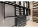 Custom closet with built-in shelving, drawers, and ample storage space at 434 Marietta Nw St # 301, Atlanta, GA 30313
