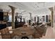 Spacious living room with exposed brick, modern kitchen, dining area, and large windows at 434 Marietta Nw St # 301, Atlanta, GA 30313