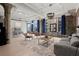 Spacious living room with exposed brick walls, large windows, hardwood floors, and stylish contemporary furnishings at 434 Marietta Nw St # 301, Atlanta, GA 30313