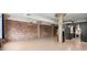 Spacious open concept living area with exposed brick and modern design elements at 434 Marietta Nw St # 301, Atlanta, GA 30313