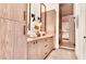 Modern bathroom with custom cabinets, double vanity, and a glass-enclosed shower at 1250 Lupo Loop, Palmetto, GA 30268