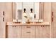 Bathroom featuring modern cabinets, double sinks, quartz countertops, and pendant lighting at 1250 Lupo Loop, Palmetto, GA 30268