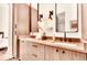 Bathroom featuring modern cabinets, double sinks, quartz countertops, and pendant lighting at 1250 Lupo Loop, Palmetto, GA 30268