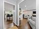 Open-concept with hardwood floors connecting the kitchen and the living room at 4883 Rock Haven Dr, Lilburn, GA 30047