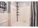 Functional bathtub/shower features tile walls, a shower caddy, and essential fixtures at 6520 Roswell Rd # 79, Sandy Springs, GA 30328