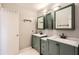 Beautiful bathroom with dual vanities, marble countertops, and modern fixtures at 6520 Roswell Rd # 79, Sandy Springs, GA 30328