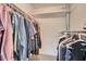 Spacious closet with ample hanging space, shelving and neutral carpeting at 6520 Roswell Rd # 79, Sandy Springs, GA 30328