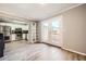 Open dining area connecting to a modern kitchen with balcony access at 6520 Roswell Rd # 79, Sandy Springs, GA 30328