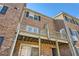 Brick exterior with a balcony, showcasing the building's architecture and outdoor living space at 6520 Roswell Rd # 79, Sandy Springs, GA 30328