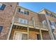 Multi-story brick building with balconies, showcasing the residential architecture and outdoor living spaces at 6520 Roswell Rd # 79, Sandy Springs, GA 30328