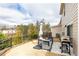 Backyard patio featuring outdoor furniture, a grill, and a fenced perimeter at 222 Ellis Ln, Woodstock, GA 30189