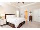 Comfortable bedroom featuring neutral walls, built-in storage underneath the bed, and ample natural light at 222 Ellis Ln, Woodstock, GA 30189