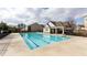 Community pool with lane markers and a nearby shaded gazebo at 222 Ellis Ln, Woodstock, GA 30189