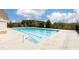 Community pool with lane markers and a concrete pool deck at 222 Ellis Ln, Woodstock, GA 30189
