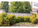 Entrance sign to the Aldyn community with shrubbery at 222 Ellis Ln, Woodstock, GA 30189