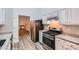 Modern kitchen with stainless steel appliances and granite countertops at 4394 Estate St, Atlanta, GA 30349