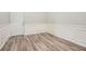 This room features pristine wainscotting and wood-look floors at 4394 Estate St, Atlanta, GA 30349