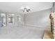 Open living area featuring a fireplace and views into the dining room at 648 Ocean Ave, Canton, GA 30114