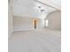 Spacious primary bedroom with vaulted ceilings and neutral carpeting at 648 Ocean Ave, Canton, GA 30114