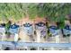 An aerial view of homes with lush surrounding trees showcases a beautiful neighborhood at 76 Misty View Ln, Acworth, GA 30101