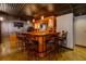 Basement bar features seating, cabinets and serving area at 76 Misty View Ln, Acworth, GA 30101