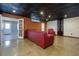 Finished basement with decorative ceiling, stained concrete floor, and living space at 76 Misty View Ln, Acworth, GA 30101