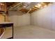 Unfinished basement with concrete walls and floors at 76 Misty View Ln, Acworth, GA 30101