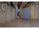 Unfinished basement featuring concrete floor and walls, exposed insulation, and duct work at 76 Misty View Ln, Acworth, GA 30101
