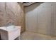 Unfinished basement with concrete walls, insulation, and utility sink at 76 Misty View Ln, Acworth, GA 30101