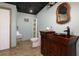 Well-appointed bathroom with wood look floors, custom sink and storage cabinet at 76 Misty View Ln, Acworth, GA 30101