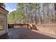 Relaxing outdoor living with a spacious wooden deck and natural landscape at 76 Misty View Ln, Acworth, GA 30101