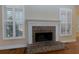 Close up on Fireplace with windows on both sides at 76 Misty View Ln, Acworth, GA 30101