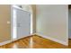 Bright foyer with hardwood floors, complemented by sidelight windows and a white front door at 76 Misty View Ln, Acworth, GA 30101