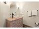 Chic bathroom with vessel sink, decorative vanity, and decorative mirror at 130 Woodlawn Ne Dr, Marietta, GA 30067
