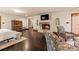 Bedroom showcasing a fireplace, sitting area, dark wood floors and neutral color palette at 130 Woodlawn Ne Dr, Marietta, GA 30067