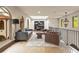 Upper living room boasts skylight, a cozy seating area, and views from arched windows at 130 Woodlawn Ne Dr, Marietta, GA 30067