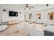 Spacious living room with neutral tones, large windows, and stylish furnishings at 130 Woodlawn Ne Dr, Marietta, GA 30067