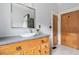 Bathroom featuring a granite countertop, vessel sink, and decorative wood cabinetry at 205 Mead Rd, Decatur, GA 30030