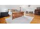 Spacious bedroom featuring hardwood floors, a cozy sitting area, and natural light at 205 Mead Rd, Decatur, GA 30030