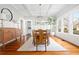 Formal dining room featuring coffered ceilings, hardwood floors, and ample natural light at 205 Mead Rd, Decatur, GA 30030
