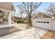 Detached two-car garage with neutral siding and a concrete driveway at 205 Mead Rd, Decatur, GA 30030