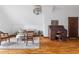 Cozy sitting area with natural light, hardwood floors, and vintage desk at 205 Mead Rd, Decatur, GA 30030